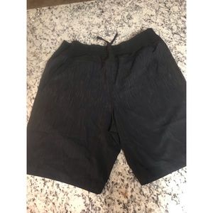 Men’s FL2 by Fabletics black athletic shorts